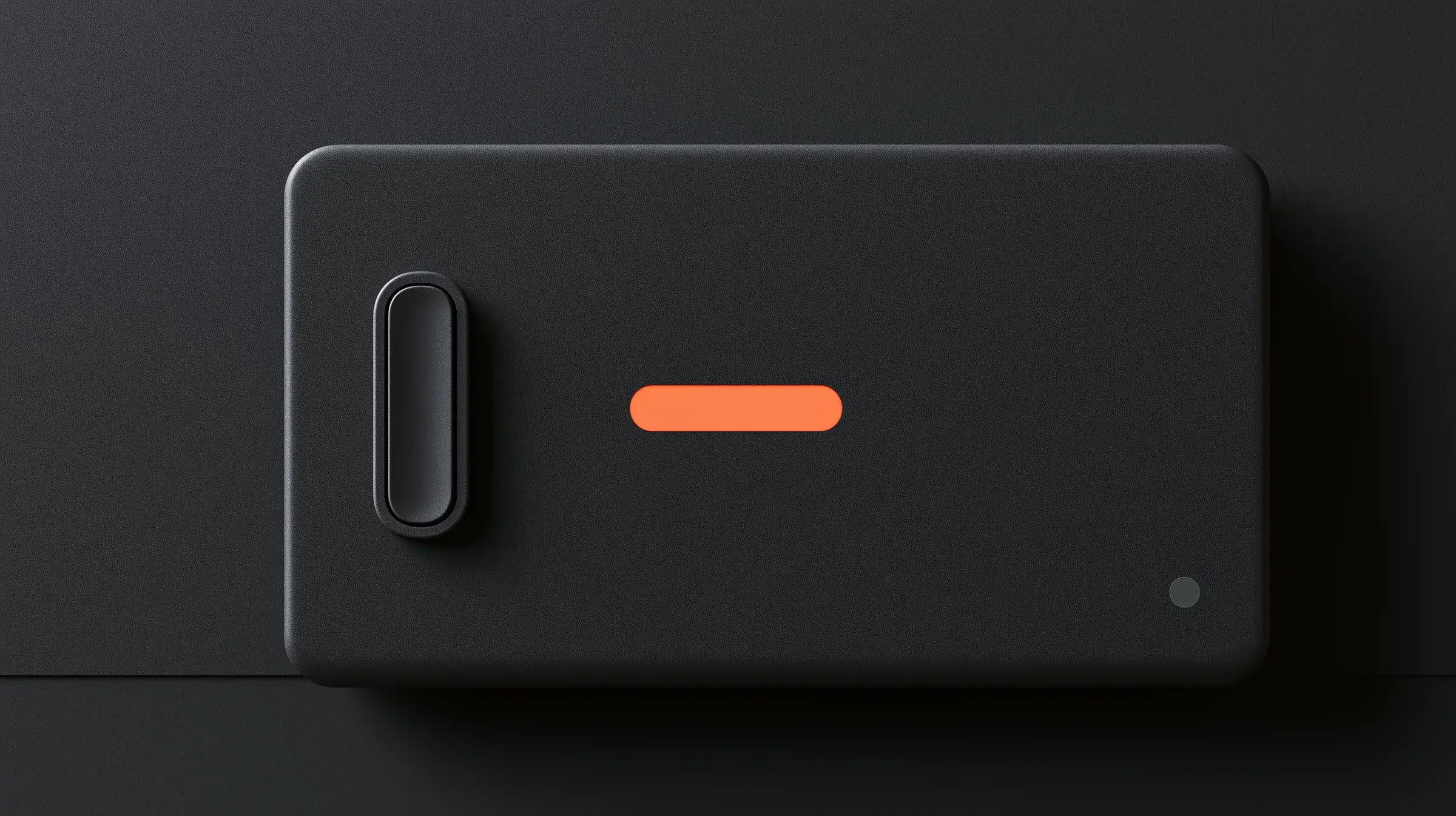 A dark physical control panel with a single illuminated orange action